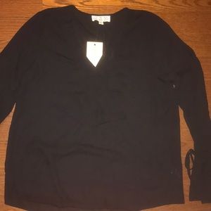 Black crossover blouse